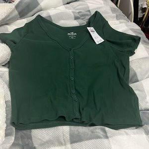 Green button up shirt
